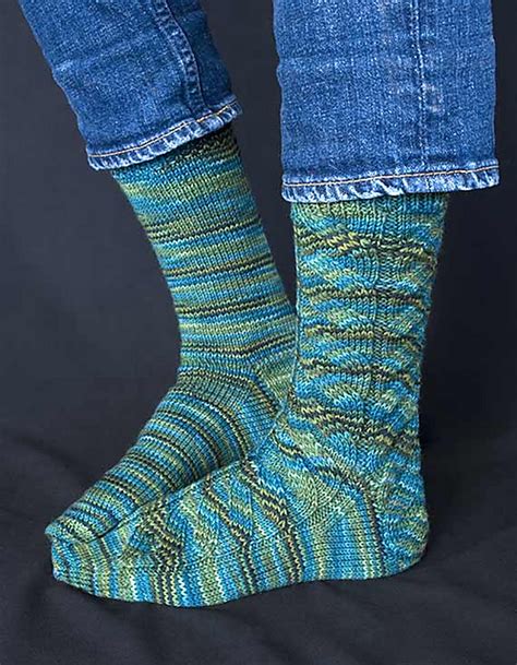 Hollow socks - Wool Crew Socks From what we can tell, the crew socks are essentially a longer version of the ankle socks, using the same yarn blend and the same knitting pattern. The cuff rises to 3-4” above the ankle bone and fits a wider calf comfortably. The crew socks have a navy, powder blue, and grey wave design that works well on the front of the sock.